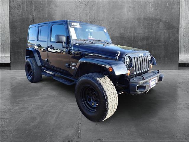 used 2011 Jeep Wrangler Unlimited car, priced at $15,798