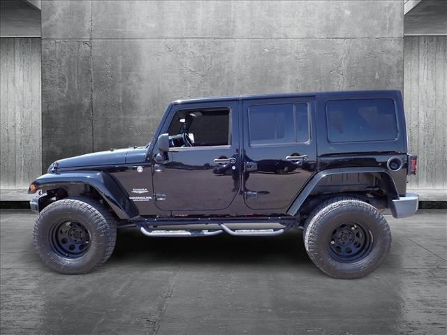 used 2011 Jeep Wrangler Unlimited car, priced at $13,598
