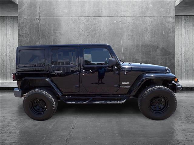 used 2011 Jeep Wrangler Unlimited car, priced at $13,598