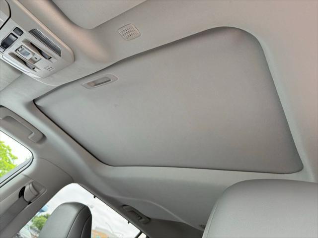 used 2022 Toyota Highlander Hybrid car, priced at $40,998