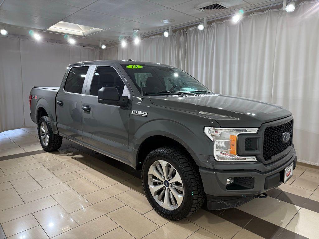 used 2018 Ford F-150 car, priced at $28,704