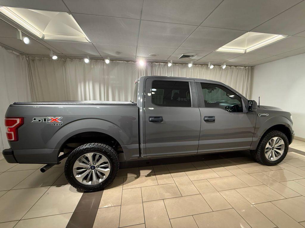 used 2018 Ford F-150 car, priced at $28,704