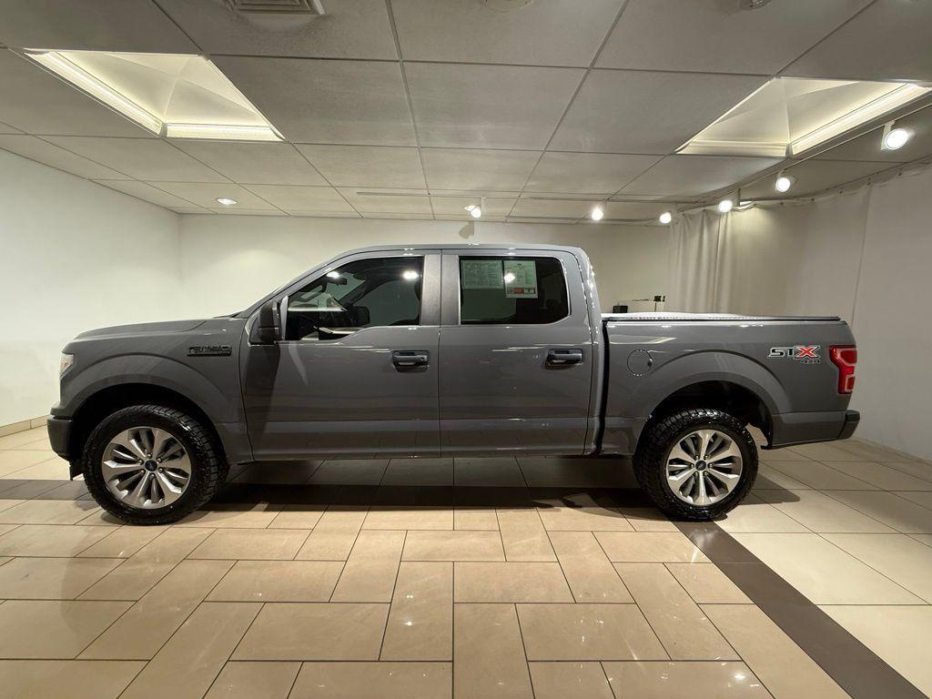 used 2018 Ford F-150 car, priced at $28,704