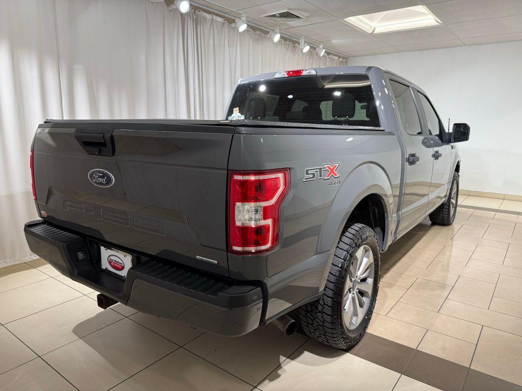 used 2018 Ford F-150 car, priced at $28,704