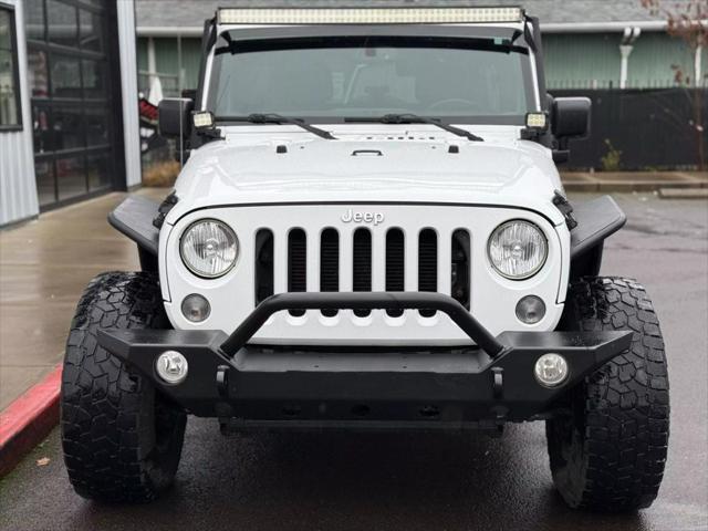 used 2016 Jeep Wrangler Unlimited car, priced at $22,995