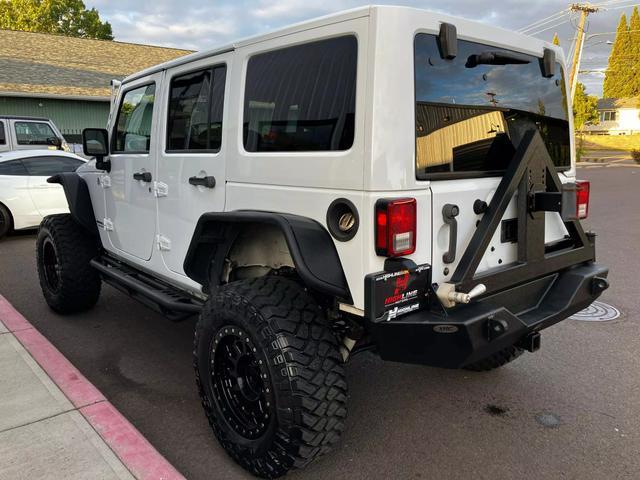 used 2014 Jeep Wrangler Unlimited car, priced at $25,995