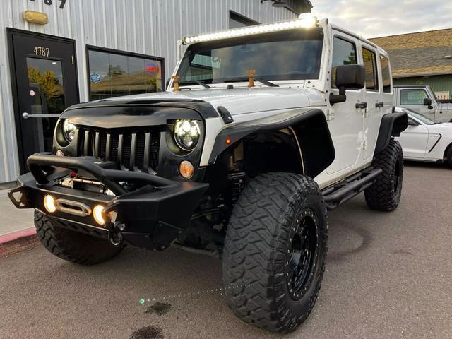 used 2014 Jeep Wrangler Unlimited car, priced at $25,995