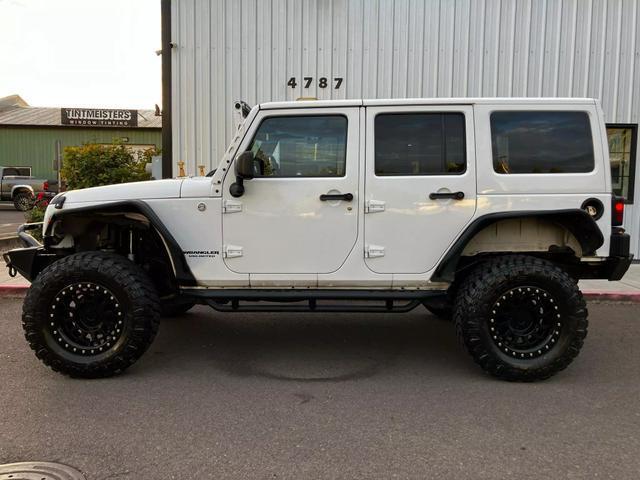 used 2014 Jeep Wrangler Unlimited car, priced at $25,995