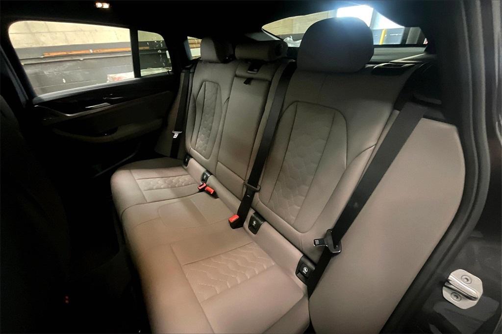 new 2025 BMW X4 M car, priced at $89,965
