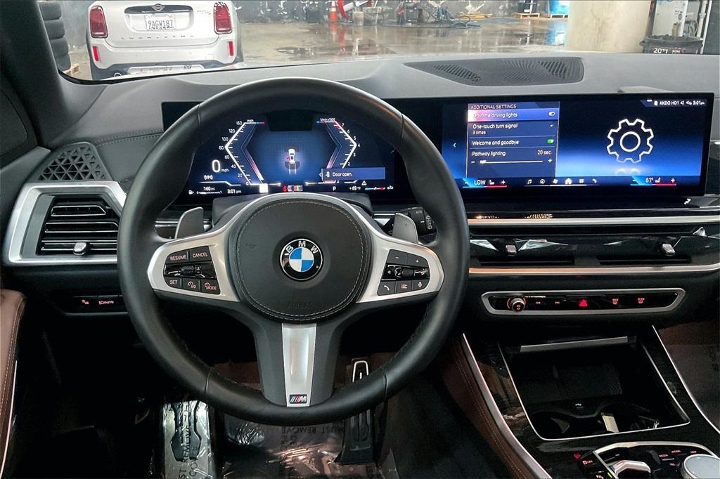 used 2024 BMW X5 car, priced at $67,495
