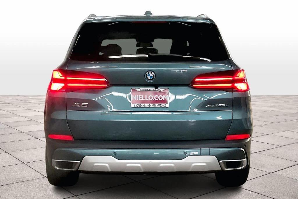 used 2025 BMW X5 PHEV car, priced at $68,803