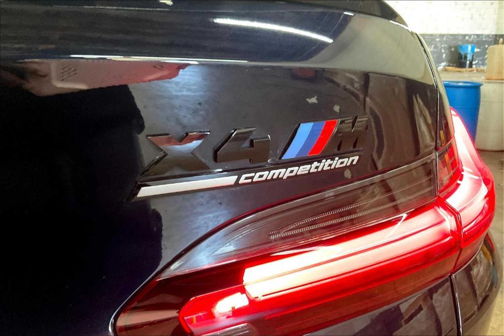 used 2022 BMW X4 M car, priced at $57,697