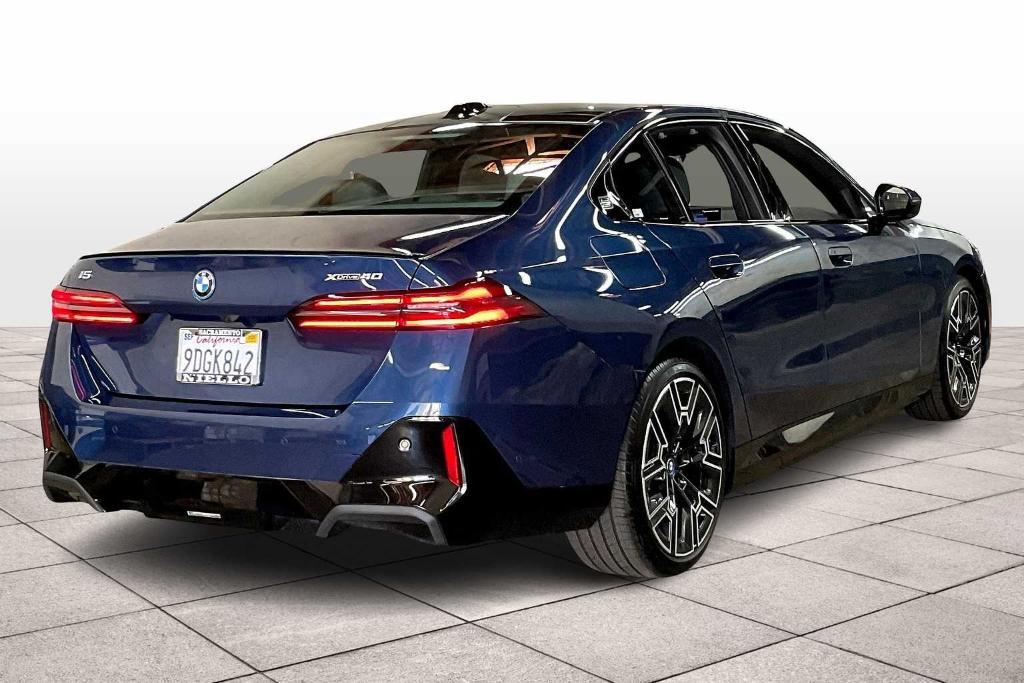 used 2025 BMW i5 car, priced at $72,992