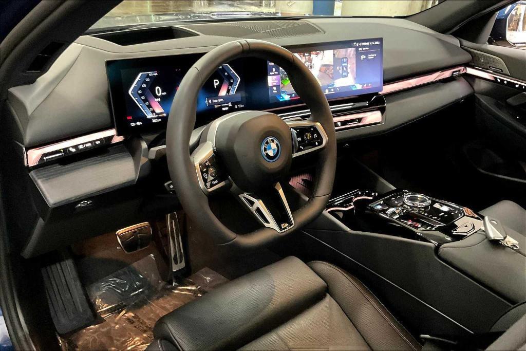 used 2025 BMW i5 car, priced at $72,992