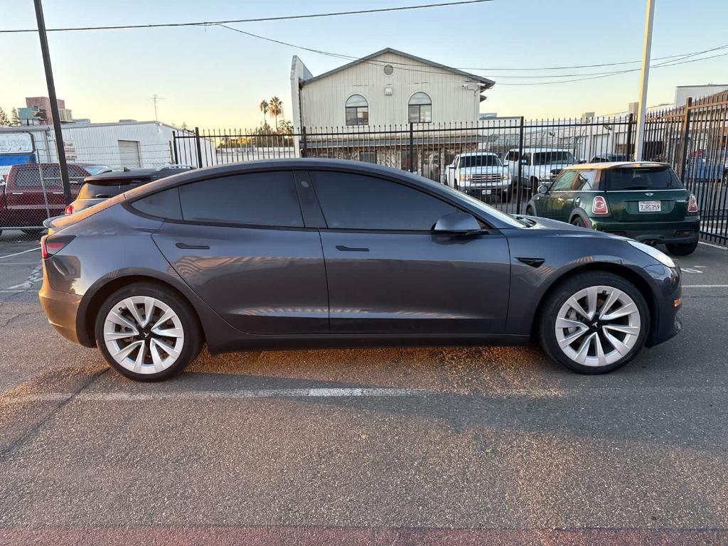 used 2023 Tesla Model 3 car, priced at $26,996
