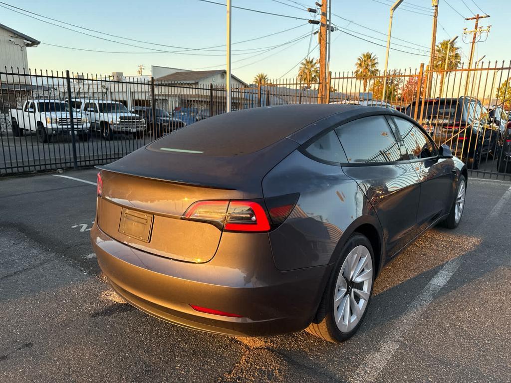 used 2023 Tesla Model 3 car, priced at $26,996