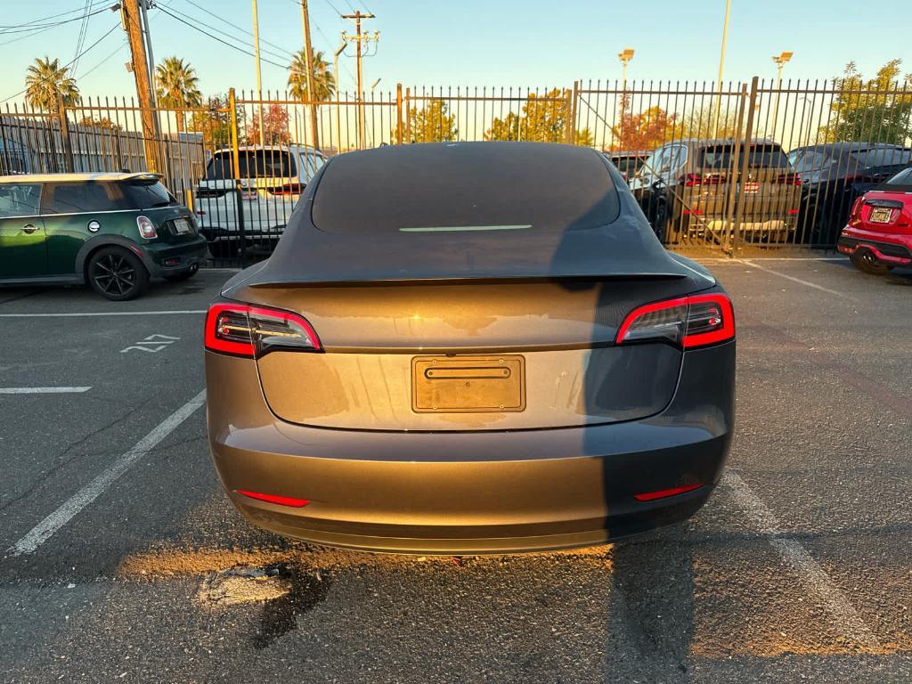 used 2023 Tesla Model 3 car, priced at $26,996