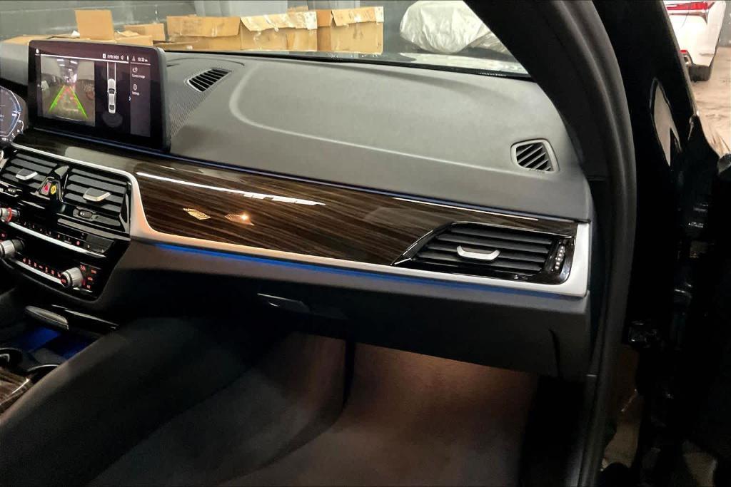 used 2023 BMW 530e car, priced at $34,652