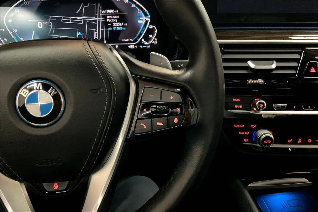 used 2023 BMW 530e car, priced at $34,652