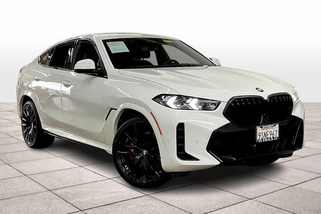 used 2025 BMW X6 car, priced at $72,992
