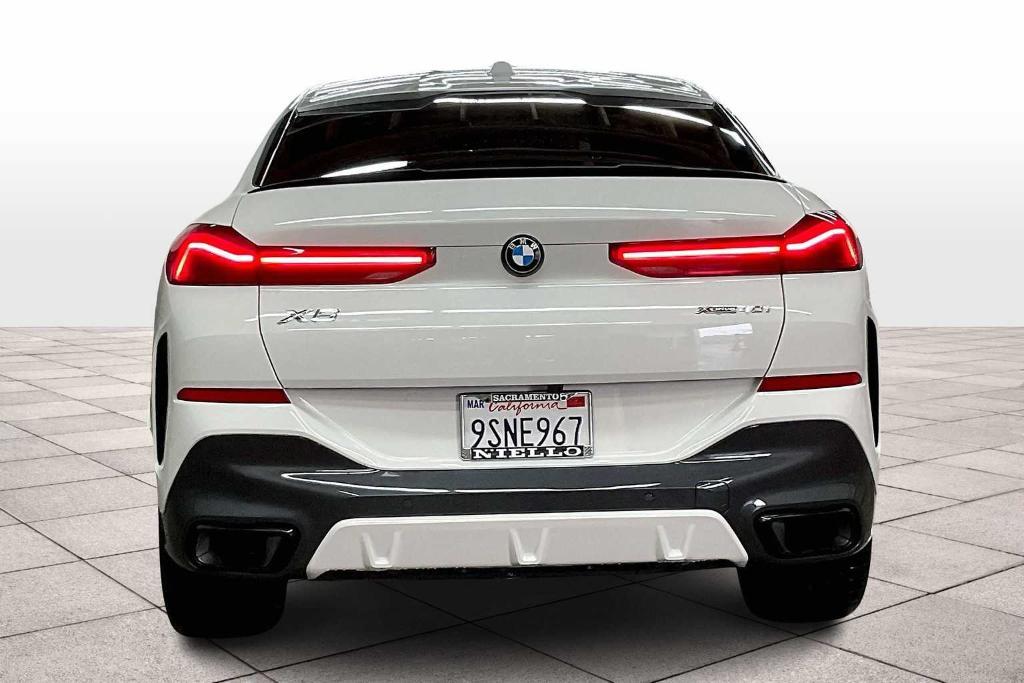 used 2025 BMW X6 car, priced at $72,992