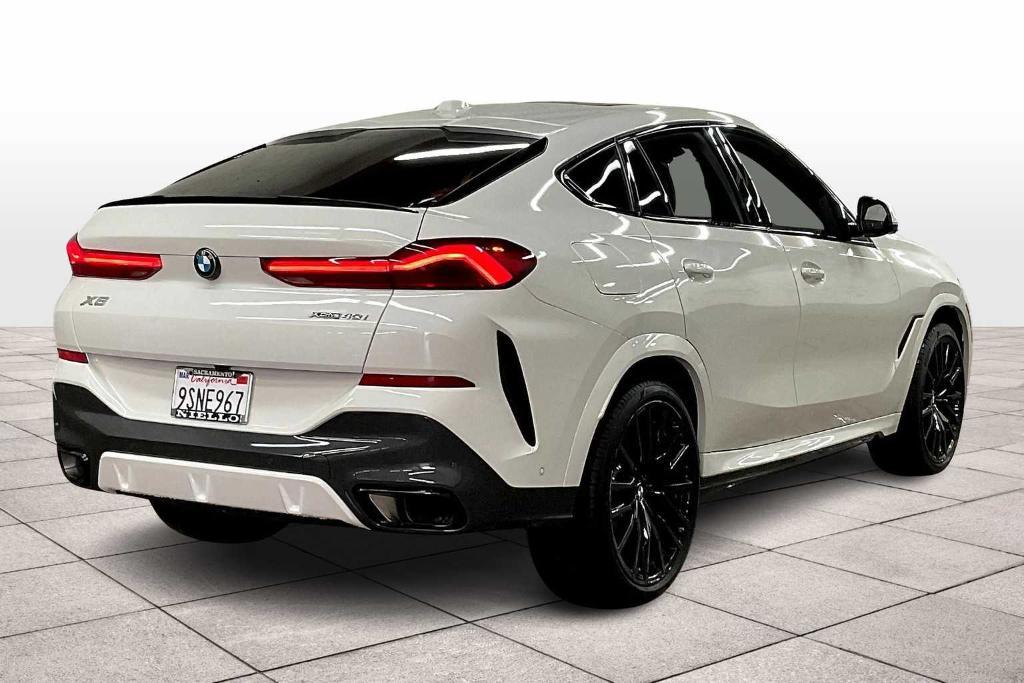 used 2025 BMW X6 car, priced at $72,992