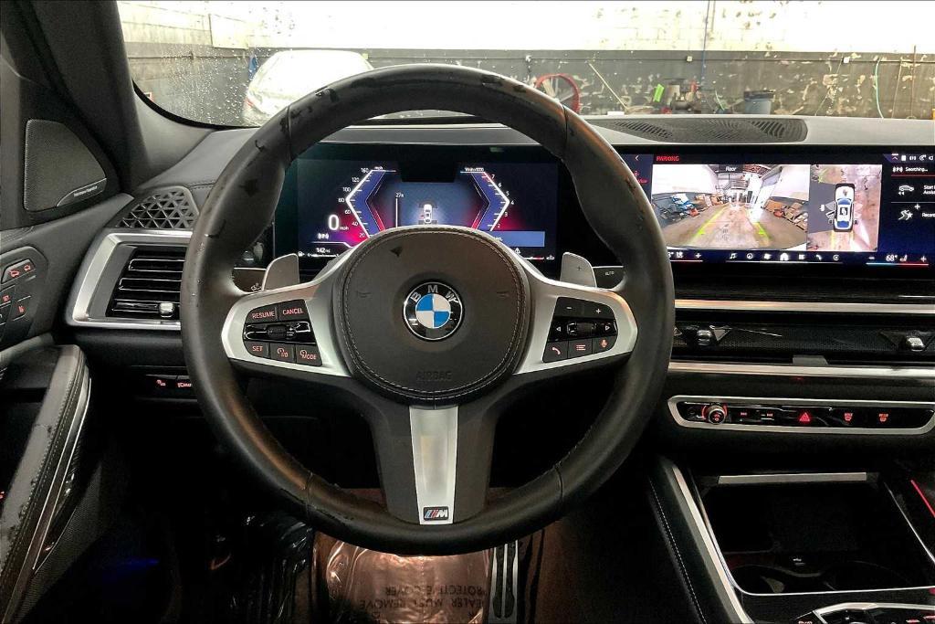used 2025 BMW X6 car, priced at $72,992