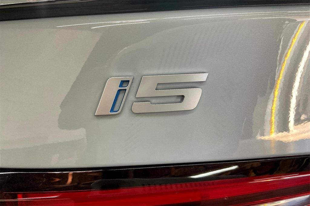used 2025 BMW i5 car, priced at $72,992