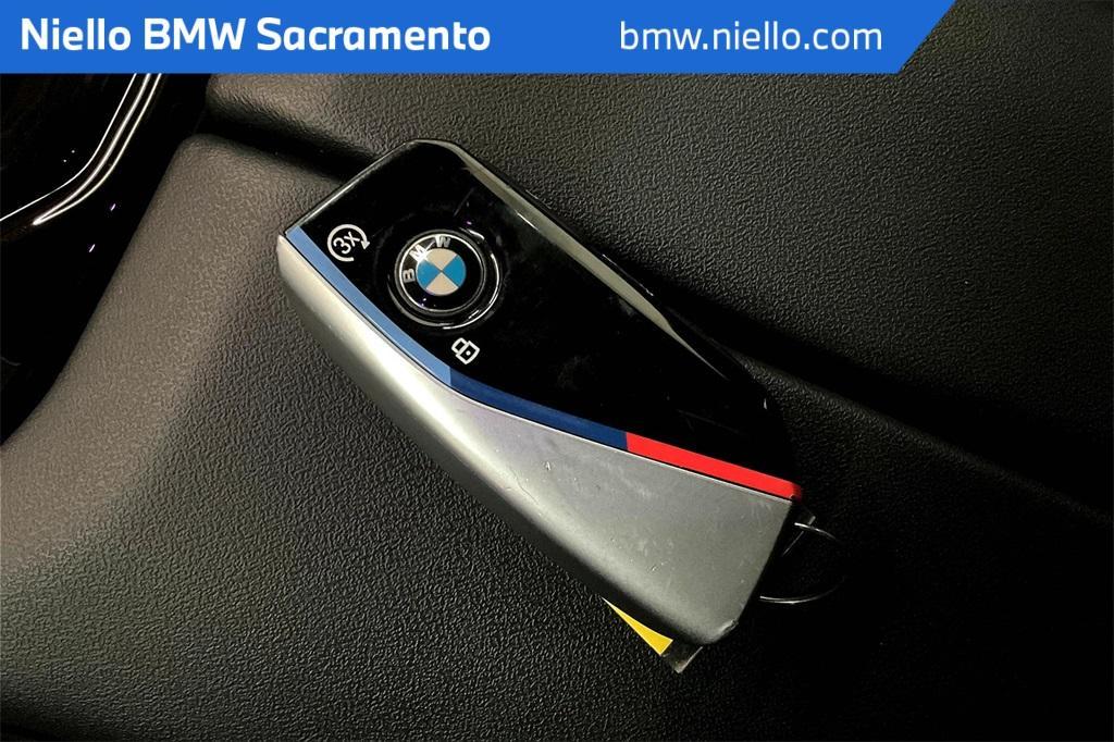 used 2024 BMW i5 car, priced at $57,787