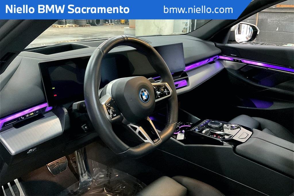 used 2024 BMW i5 car, priced at $57,787