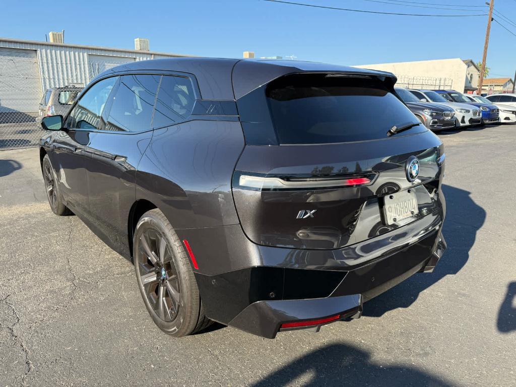 used 2024 BMW iX car, priced at $56,494