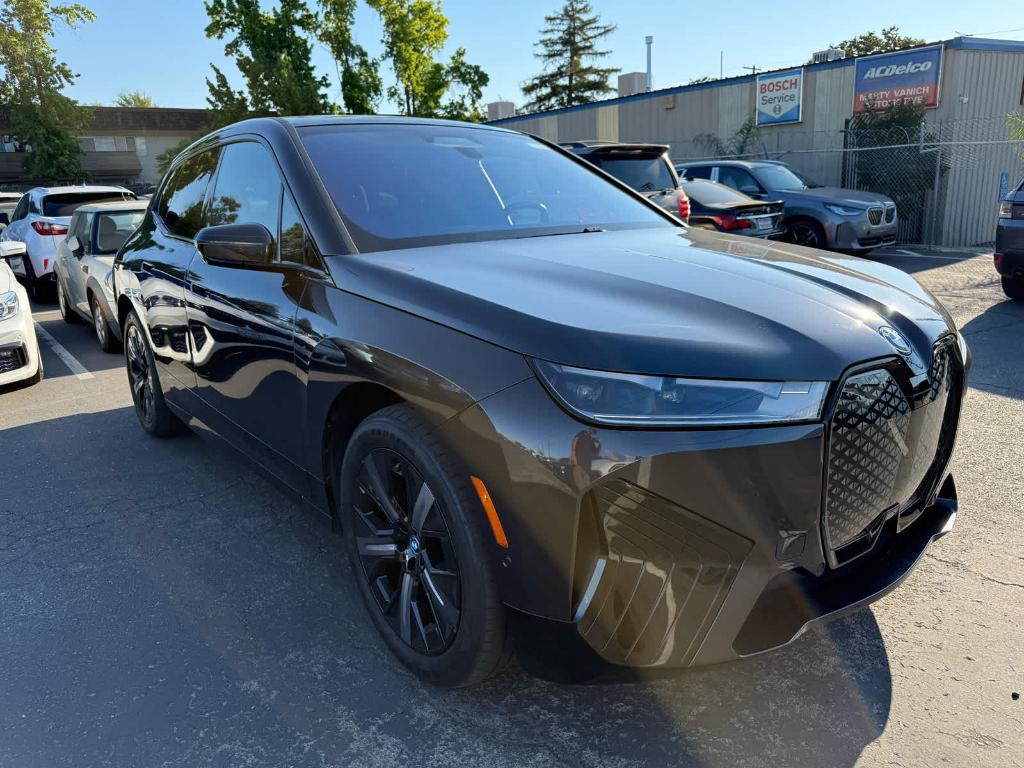 used 2024 BMW iX car, priced at $56,494