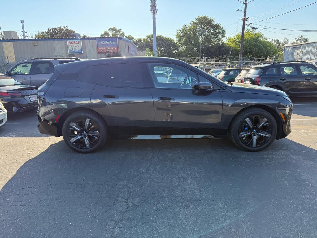 used 2024 BMW iX car, priced at $56,494