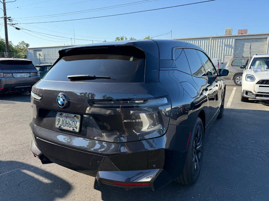 used 2024 BMW iX car, priced at $56,494