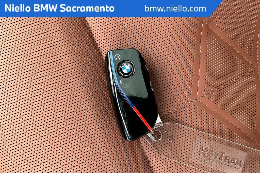 used 2024 BMW i5 car, priced at $66,996