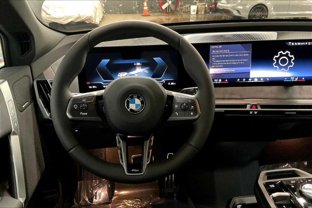 new 2026 BMW iX car, priced at $90,820