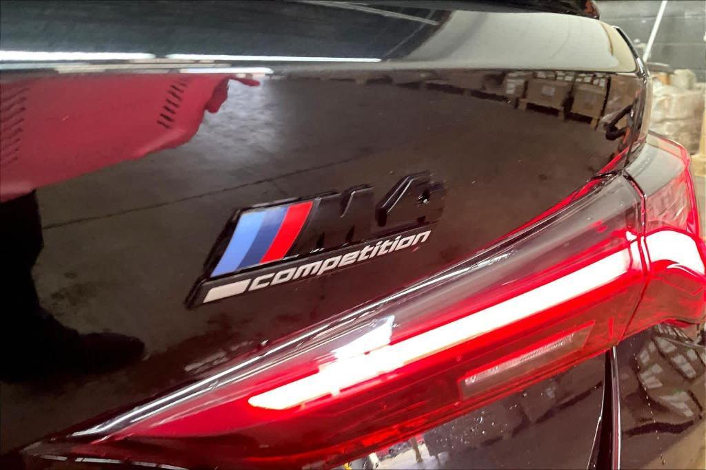 used 2023 BMW M4 car, priced at $74,609
