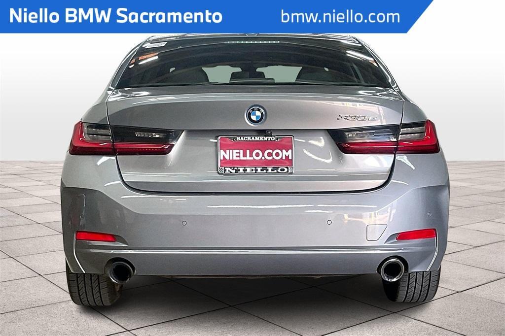 used 2023 BMW 330e car, priced at $30,693