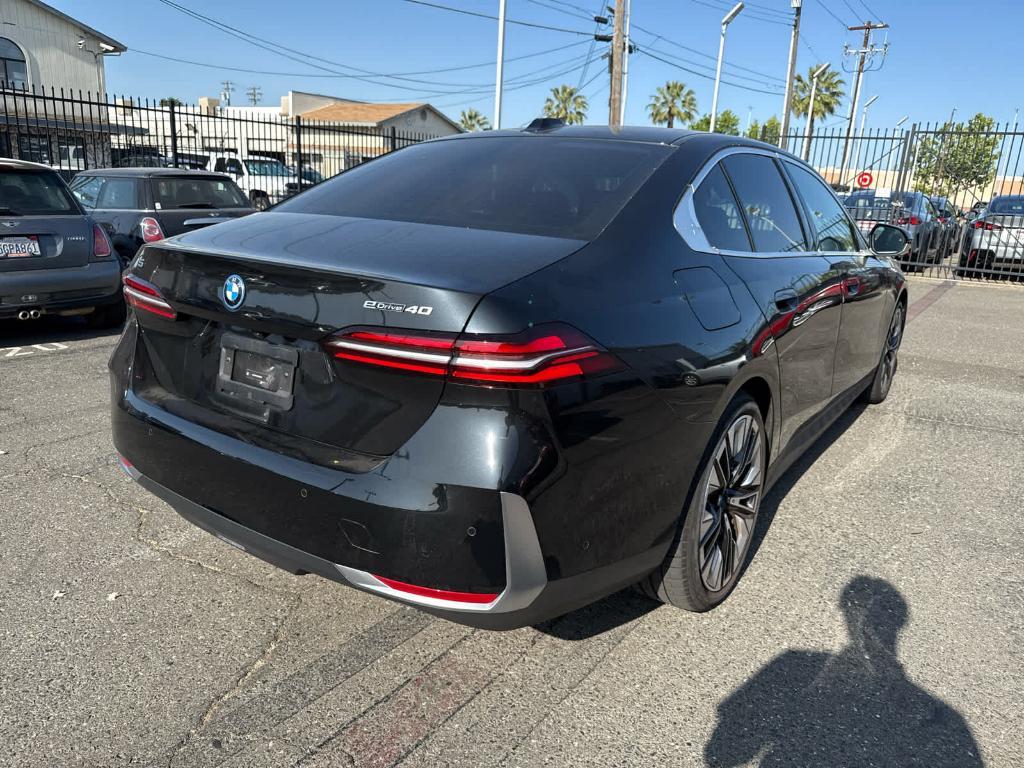 used 2024 BMW i5 car, priced at $64,000