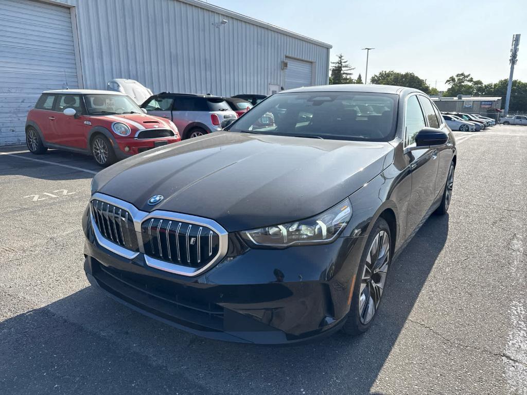 used 2024 BMW i5 car, priced at $64,000