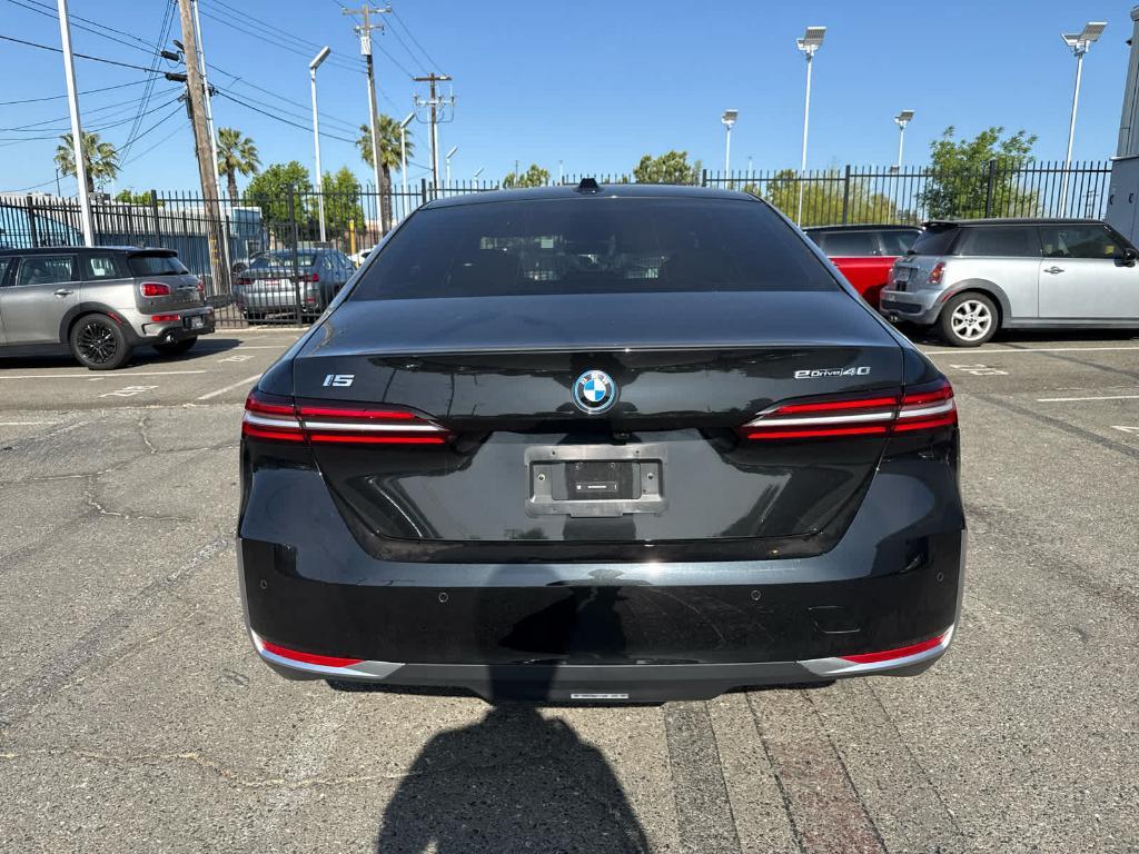 used 2024 BMW i5 car, priced at $64,000