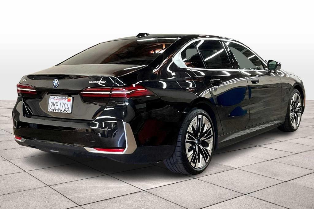 used 2024 BMW i5 car, priced at $63,383