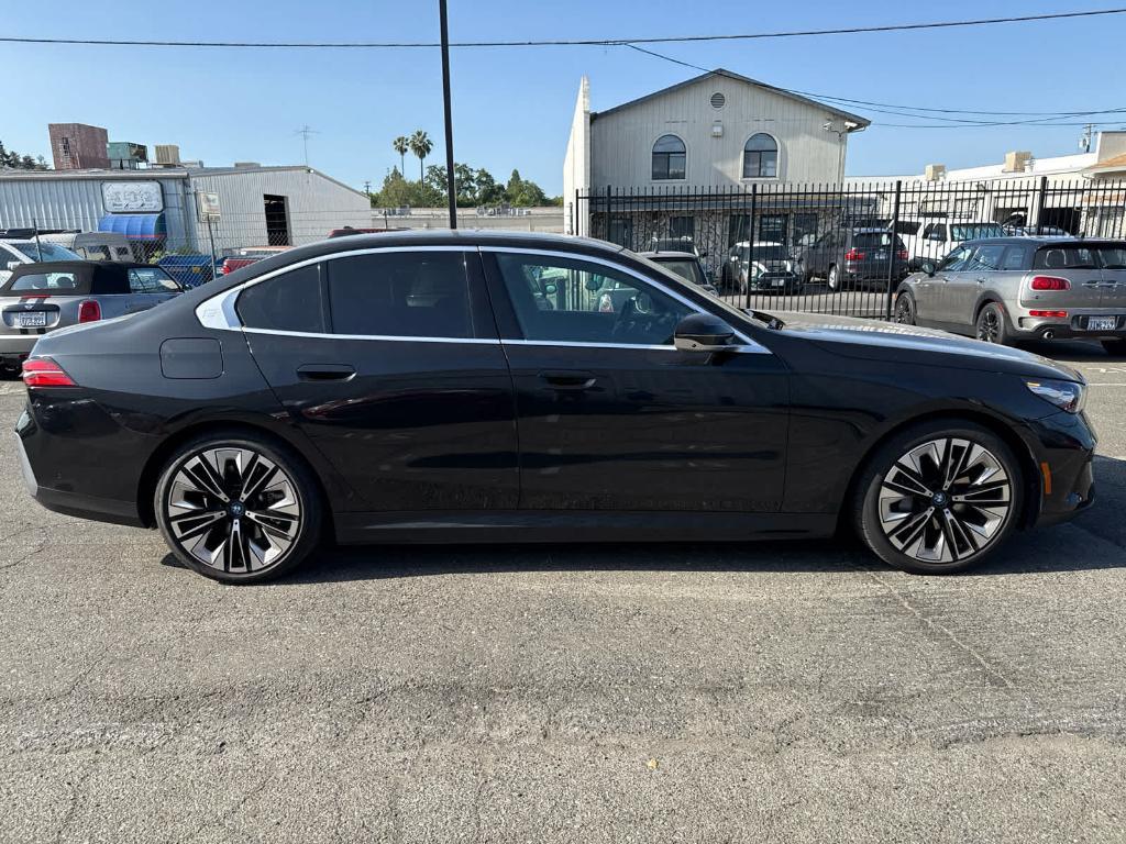 used 2024 BMW i5 car, priced at $64,000