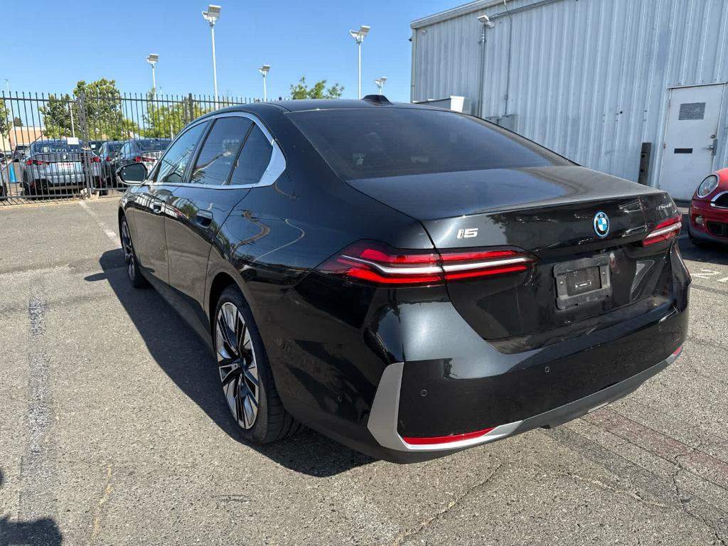used 2024 BMW i5 car, priced at $64,000