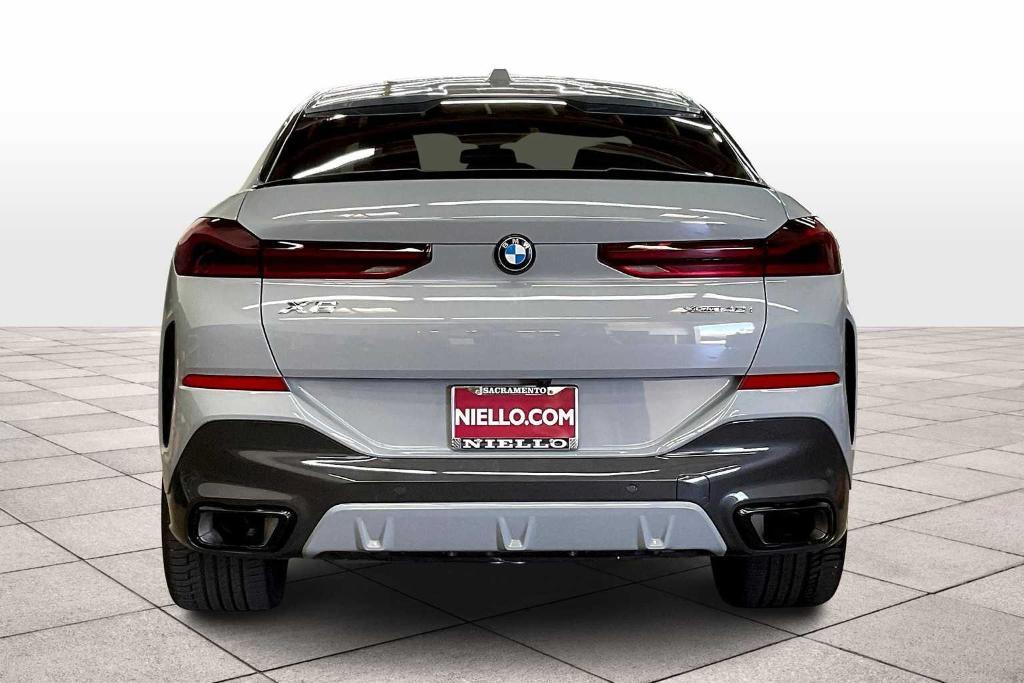 used 2024 BMW X6 car, priced at $72,895