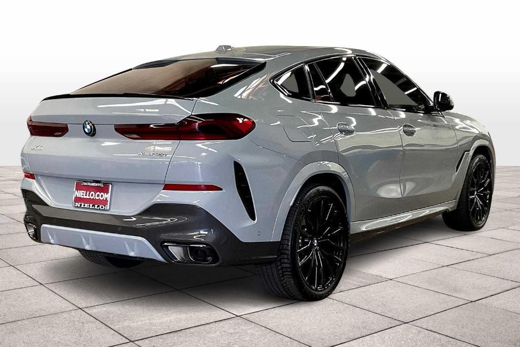 used 2024 BMW X6 car, priced at $72,895