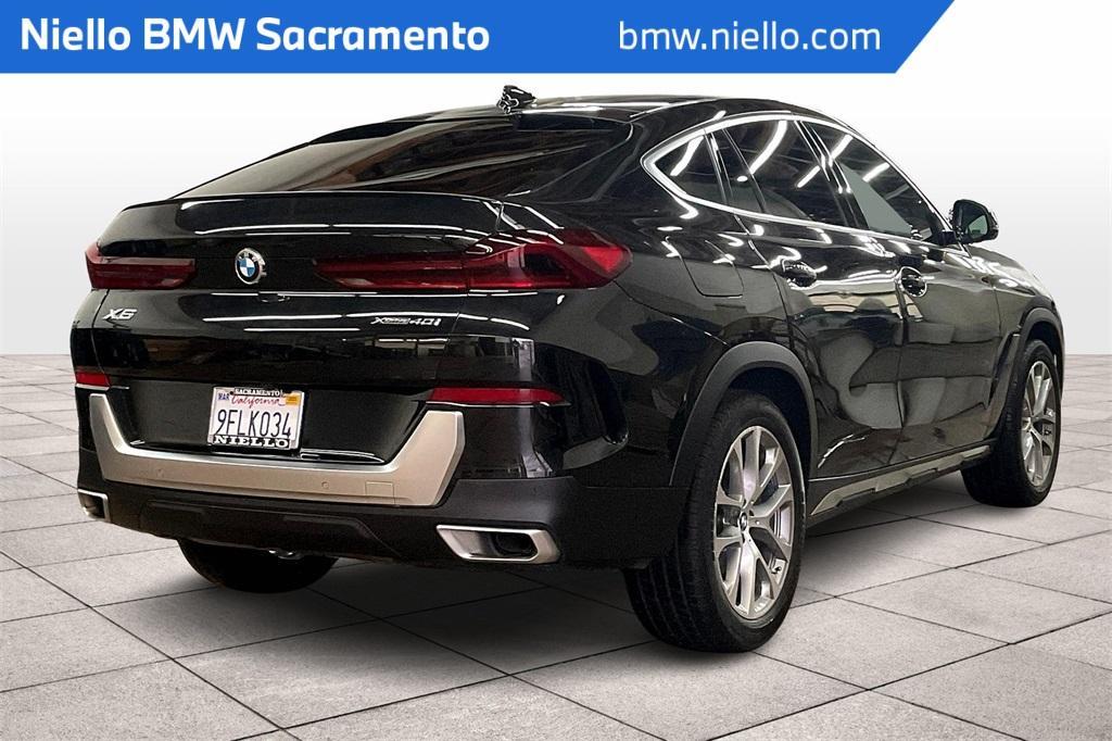 used 2023 BMW X6 car, priced at $61,991