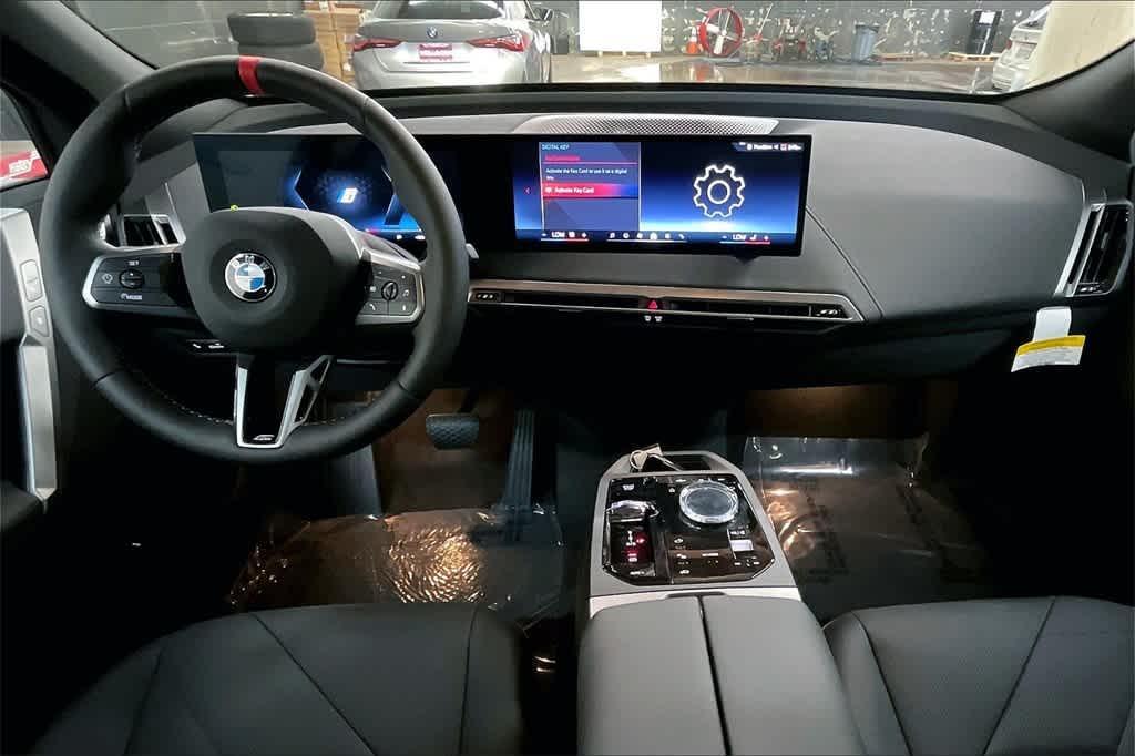 new 2025 BMW iX car, priced at $117,225