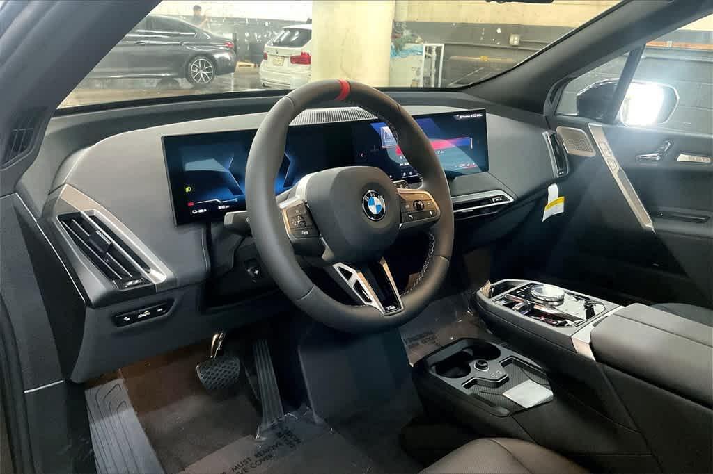 new 2025 BMW iX car, priced at $117,225