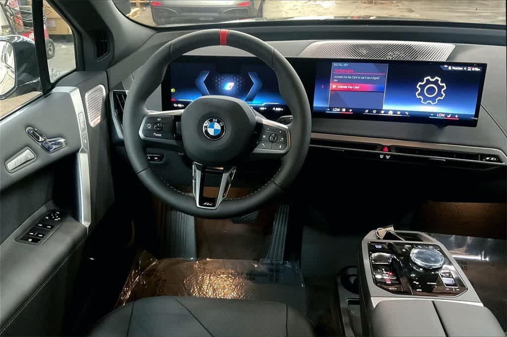 new 2025 BMW iX car, priced at $117,225